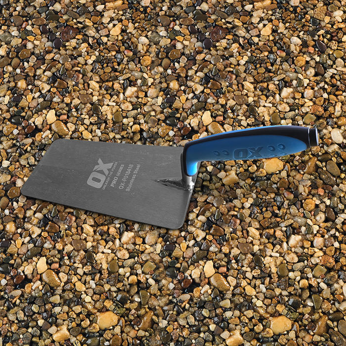 Side shot of the OX bucket trowel 180mm for resin bound instations, featuring a blue handle 