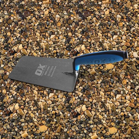 overhead shot of blue handled resin bound  Ox bucket trowel 