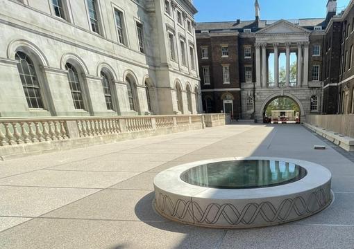 Wide sunny shot of the Quad in King's College London with a new resin bound surface