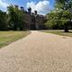 longshot image of sudbury hall driveway featuring the building and grounds